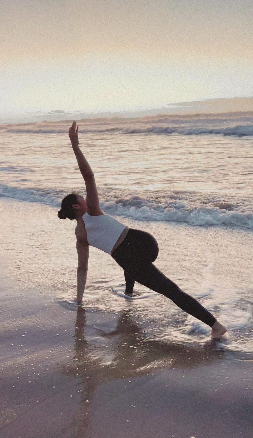 A yoga pose at the water's edge